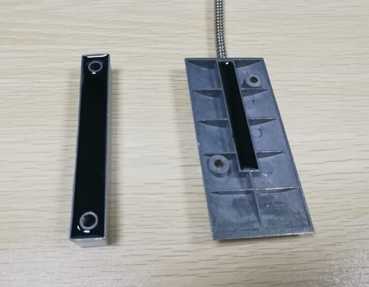 Magnetic normally closed reed switch security door contacts