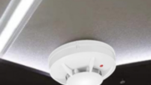 Is the red dot on the fire smoke alarm hiding the camera ？